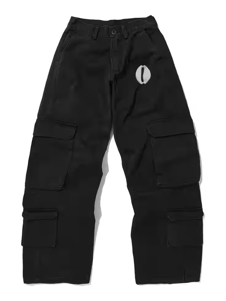 Black wide-leg cargo pants laid flat, showing the side pockets and a white cowrie emblem